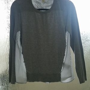 A light Grey sweater